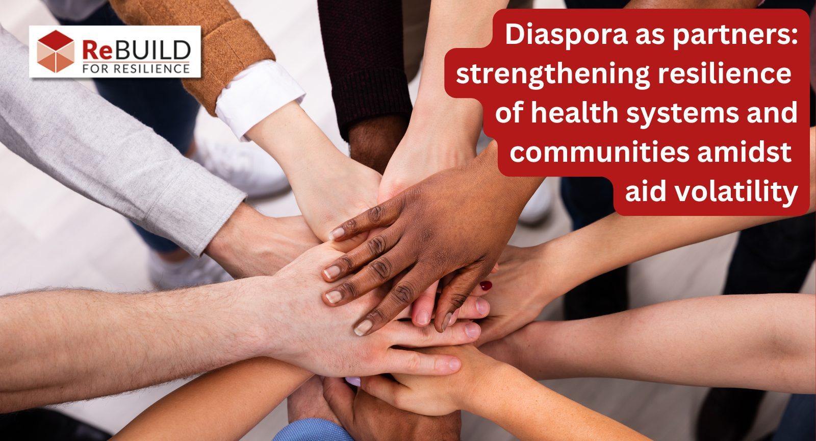 Hands of people of different ethnicities all overlapping each other