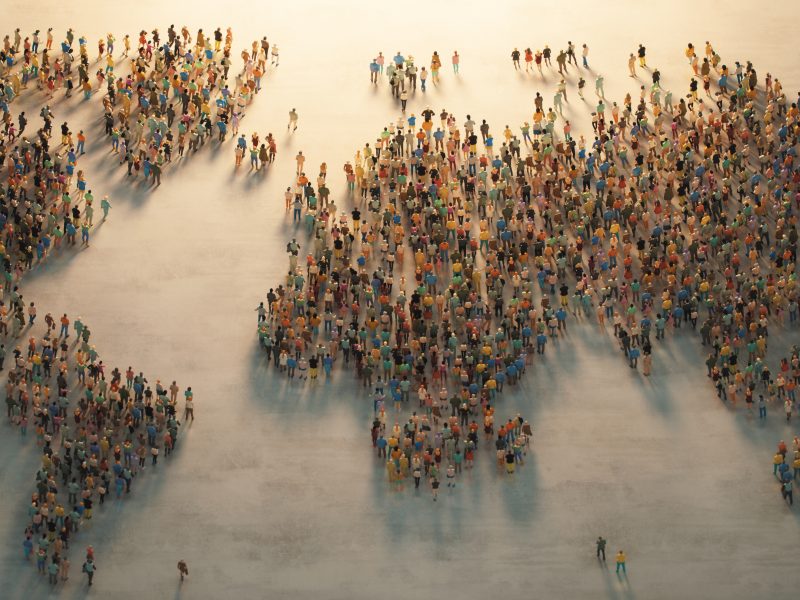 Image of the world where the land is made up of people, representing diaspora